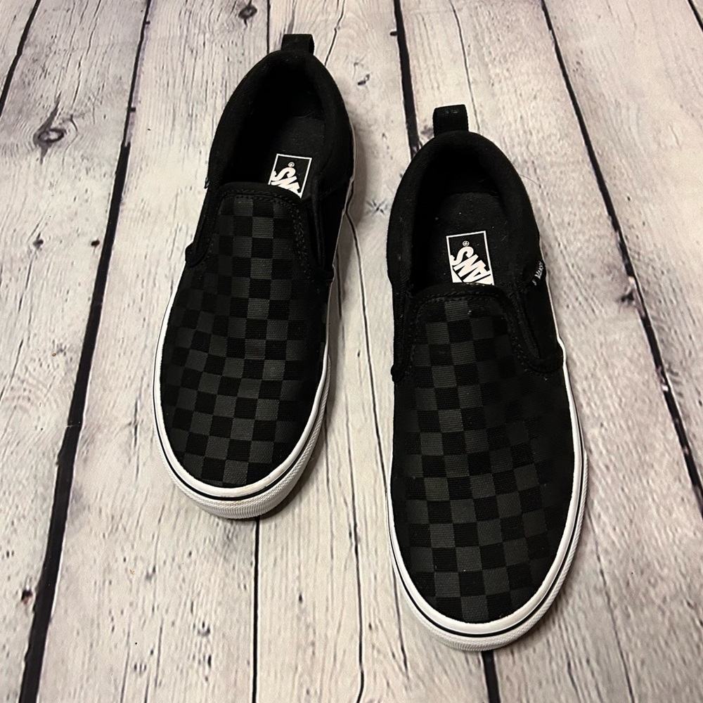 Black checkerboard vans